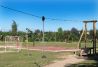 Tirolina y parque infantil